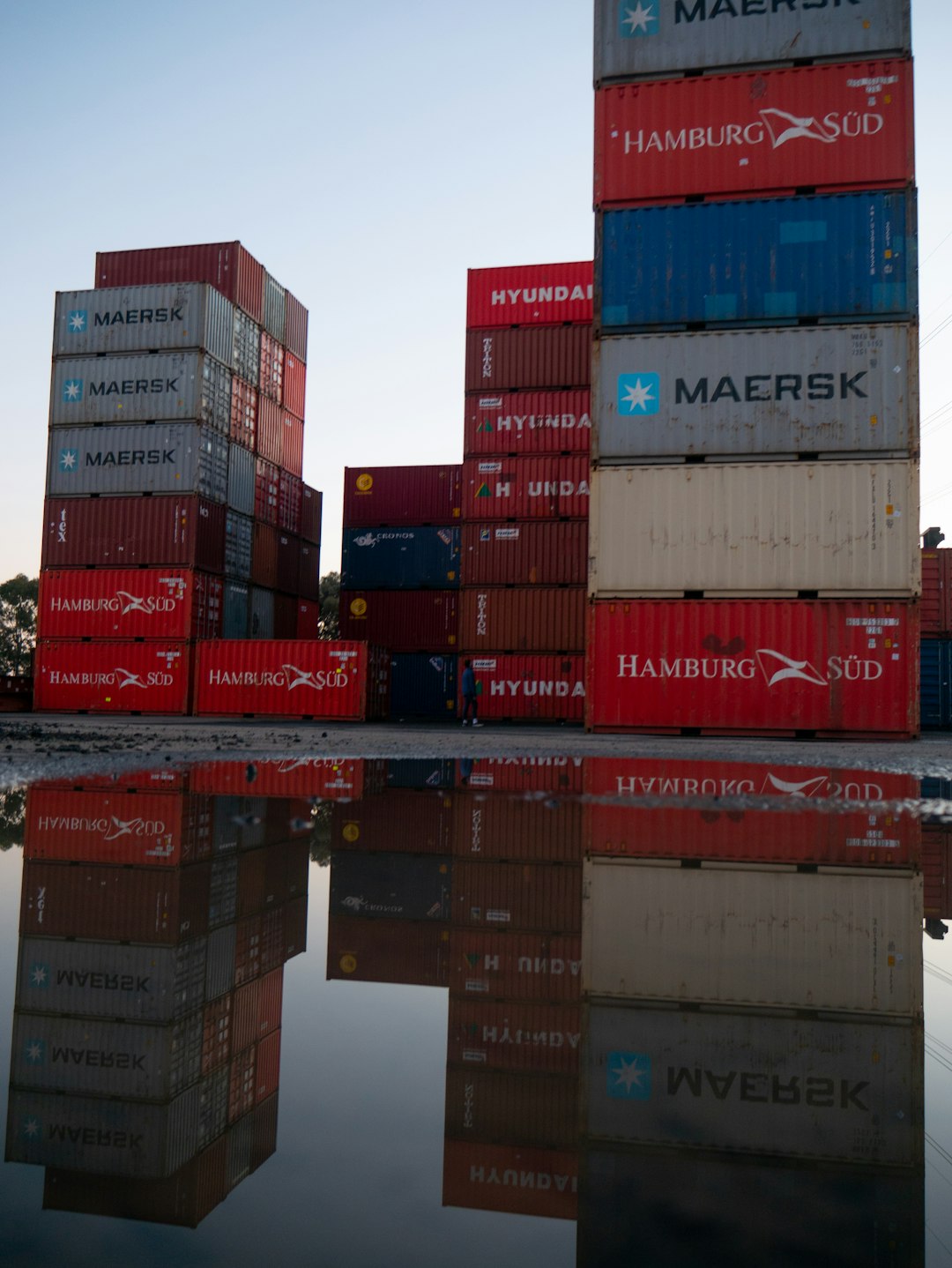 red-and-blue-cargo-containers-anrvhgyalwi